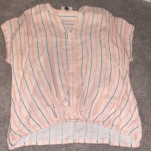 Light pink striped shirt.